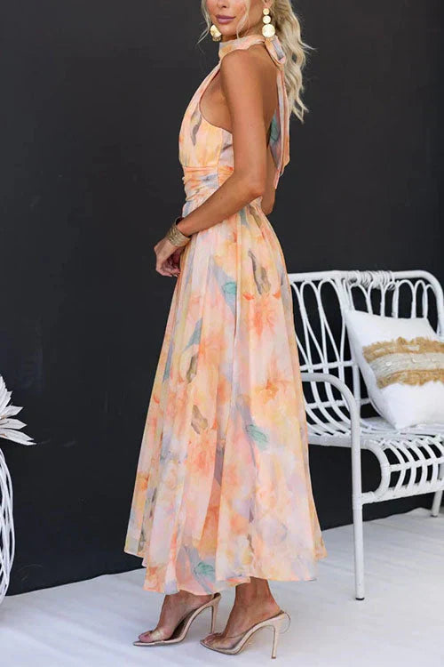 Women’s Sleeveless Maxi Dress with Halter Neck and Flowing Skirt