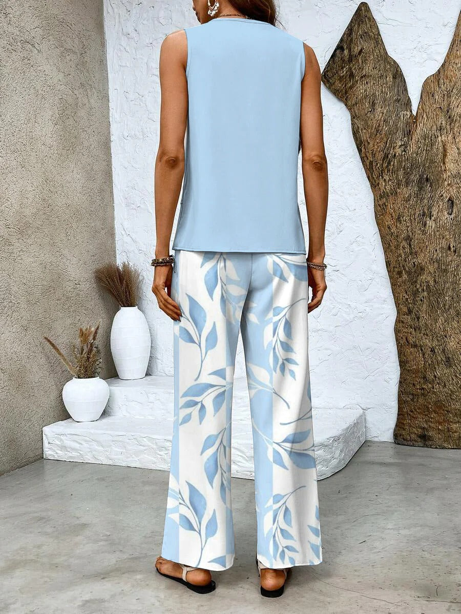 Women’s Round Neck Blouse with Layered Hem and Wide Leg Pants Set