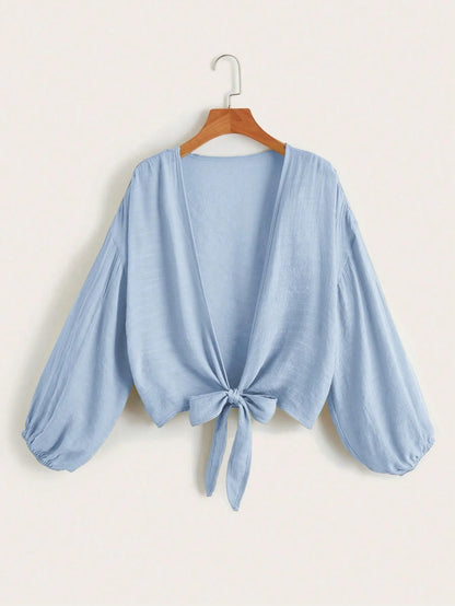 Women’s Sheer Blouse with V-Neckline and Adjustable Tie Front